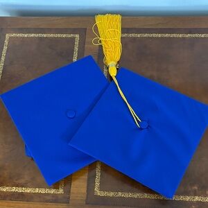 Two royal blue mortar boards